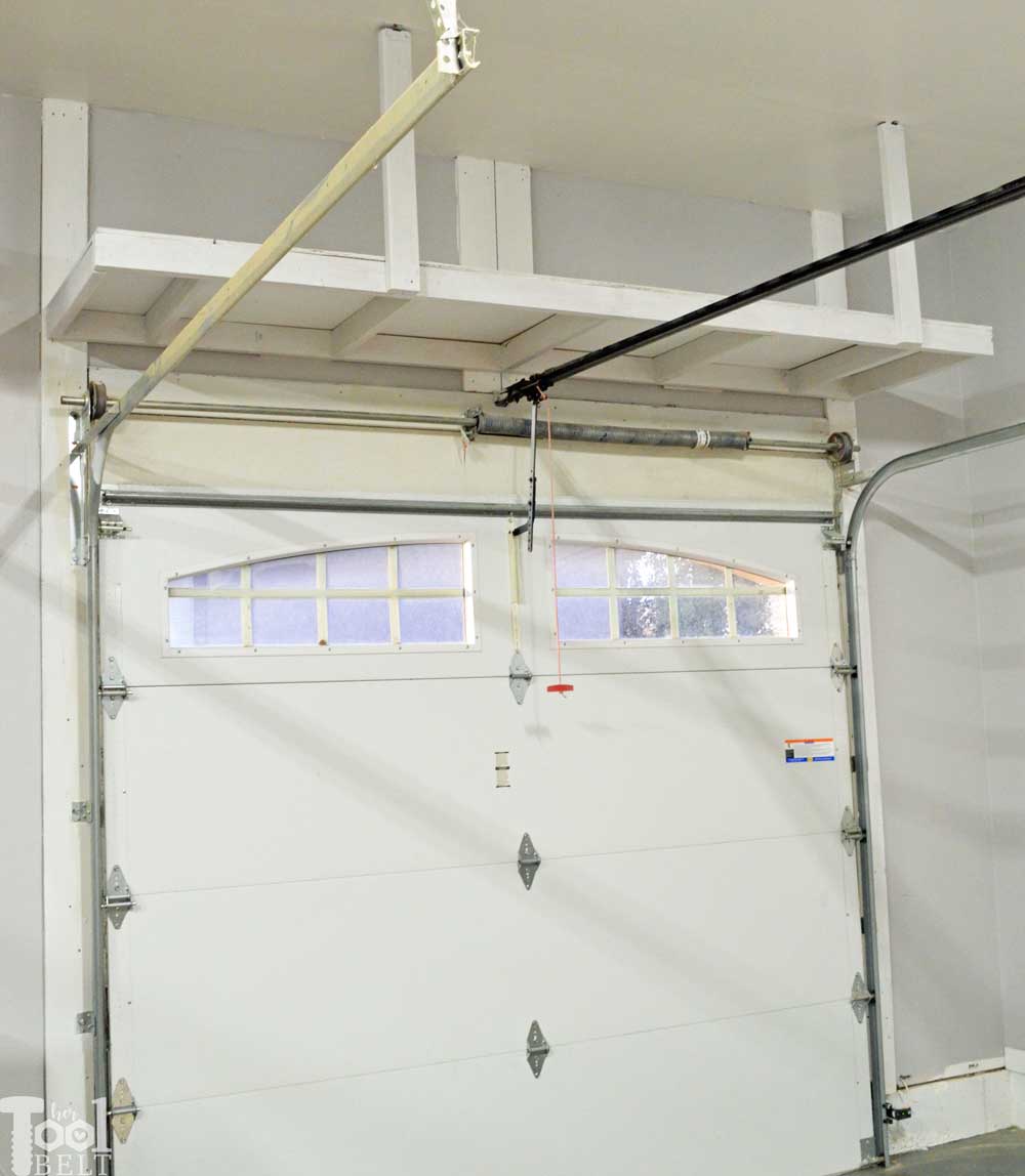 overhead-garage-storage-shelf-single-door - Her Tool Belt