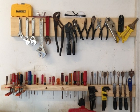 tools to hang pictures on wall
